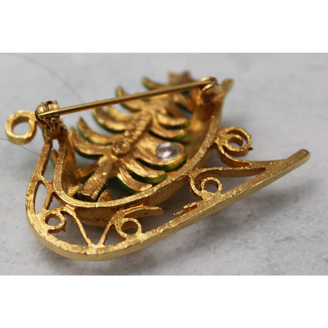 Gold Christmas Sleigh Holding a Christmas Tree Brooch Pin